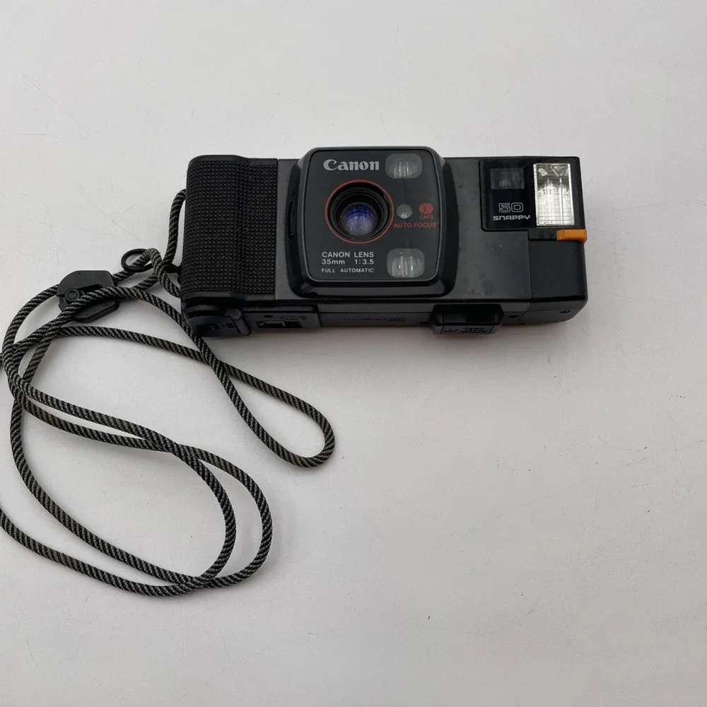Vintage Canon Snappy 50 35mm Camera w/ Built-In Flash, Adjustable Strap READ